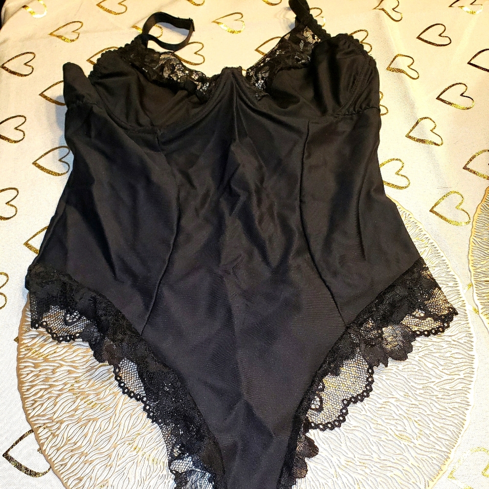Xl Black sculpting bodysuit. Never worn
